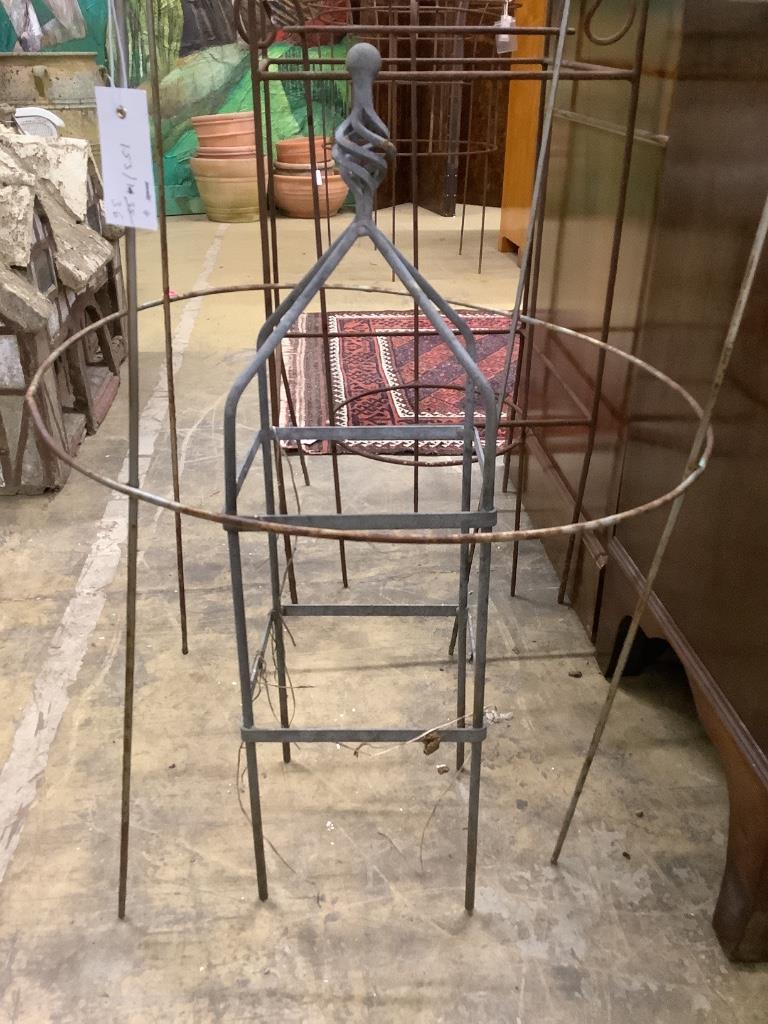 Four wrought iron growing frames, largest width 42cm, depth 42cm, height 122cm